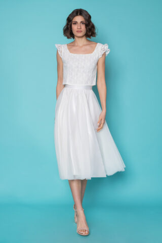 Λευκή midi φούστα από τούλι σε κλος γραμμή, με λάστιχο στη μέση και αέρινη κίνηση, για μια ρομαντική εμφάνιση.