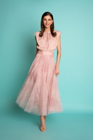 Ψηλόμεση μίντι φούστα από printed τούλι σε ροζ αποχρώσεις, με λάστιχο στη μέση και αέρινη κίνηση, για μια ρομαντική εμφάνιση.