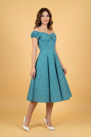 Ρετρό μίντι κλος πετρόλ φόρεμα σε vintage γραμμή με λευκά πουά, διαχρονικό και ιδανικό να φορεθεί από το πρωί μέχρι το βράδυ.